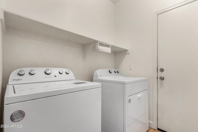 laundry area featuring washing machine and dryer