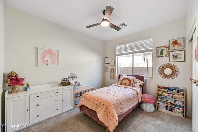 bedroom featuring light carpet and ceiling fan