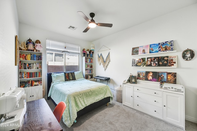 bedroom with light colored carpet and ceiling fan