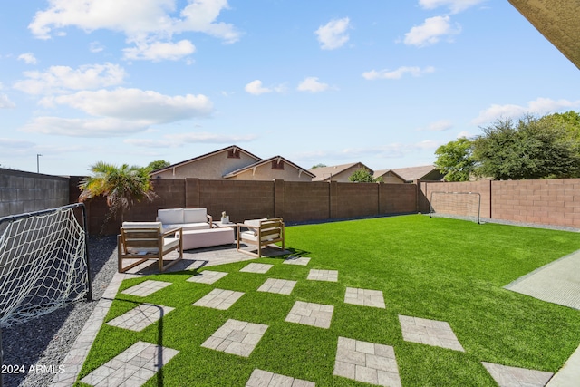 view of yard with a patio area and outdoor lounge area