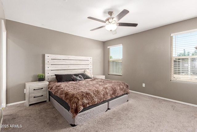 25539 W Gwen St, Buckeye, AZ 85326 - carpeted bedroom featuring baseboards and a ceiling fan