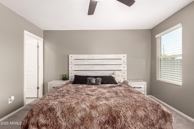 25539 W Gwen St, Buckeye, AZ 85326 - carpeted bedroom featuring baseboards and a ceiling fan