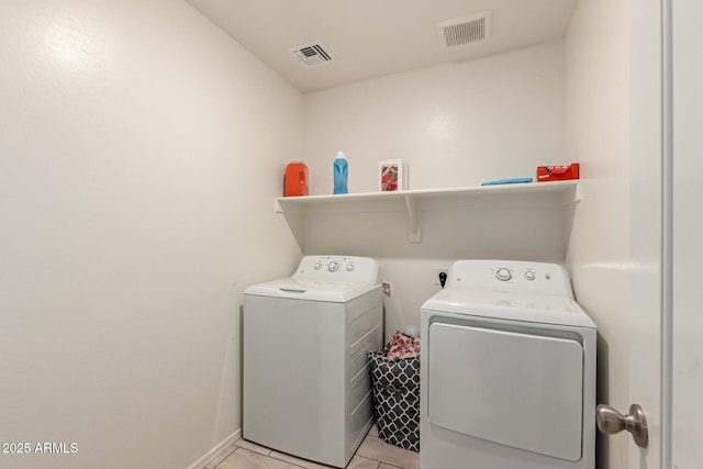 25539 W Gwen St, Buckeye, AZ 85326 - washroom featuring washing machine and dryer and light tile patterned floors