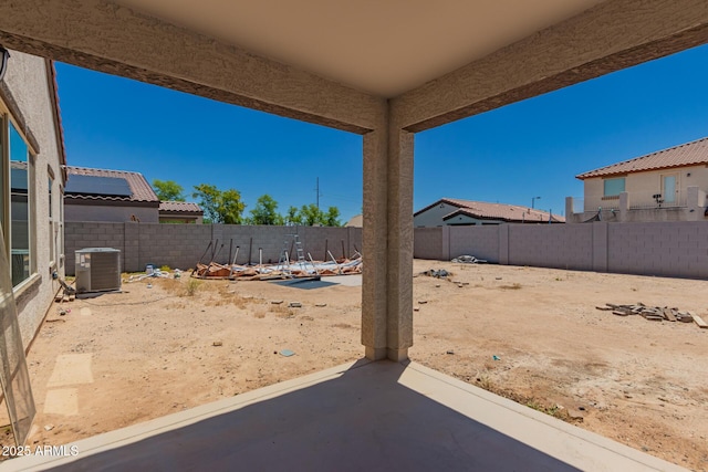 25539 W Gwen St, Buckeye, AZ 85326 - fenced backyard featuring central air condition unit and a patio
