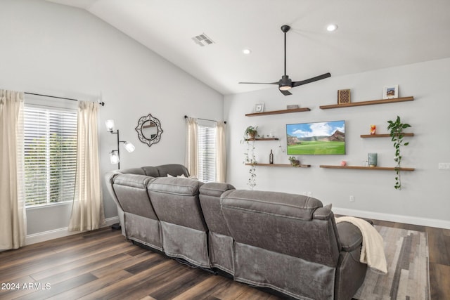 living room featuring ceiling fan, dark hardwood / wood-style floors, and lofted ceiling