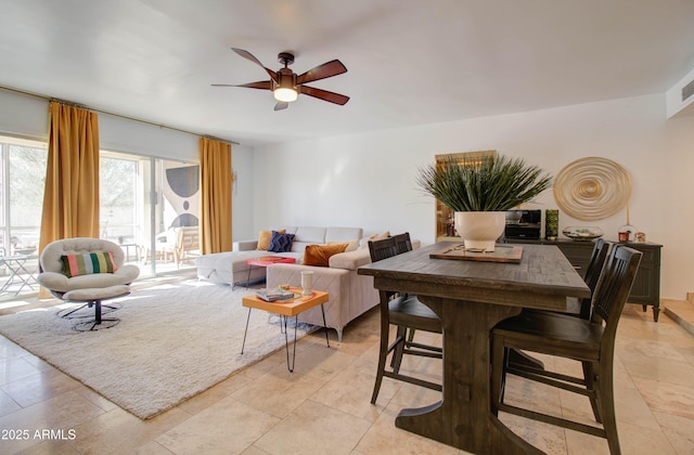 living room with ceiling fan