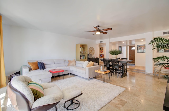 living room featuring ceiling fan