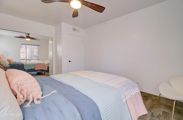 bedroom featuring ceiling fan