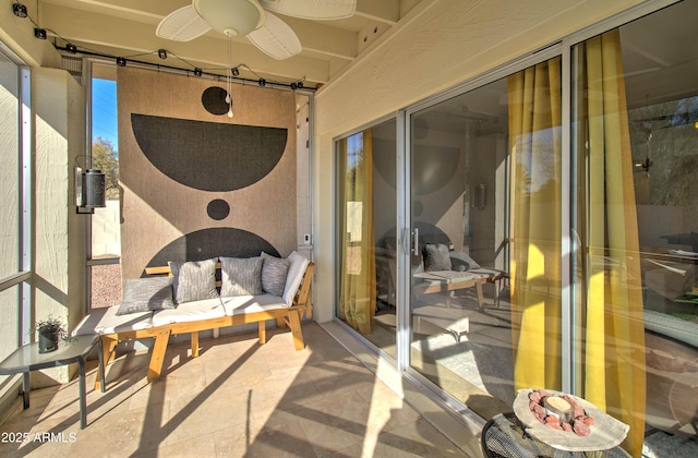 view of patio / terrace featuring ceiling fan