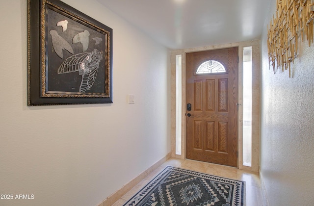 foyer with tile patterned flooring