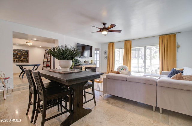 dining area featuring ceiling fan