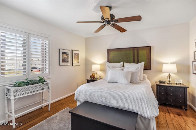 bedroom featuring hardwood / wood-style flooring and ceiling fan