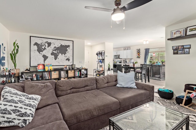 living room with ceiling fan