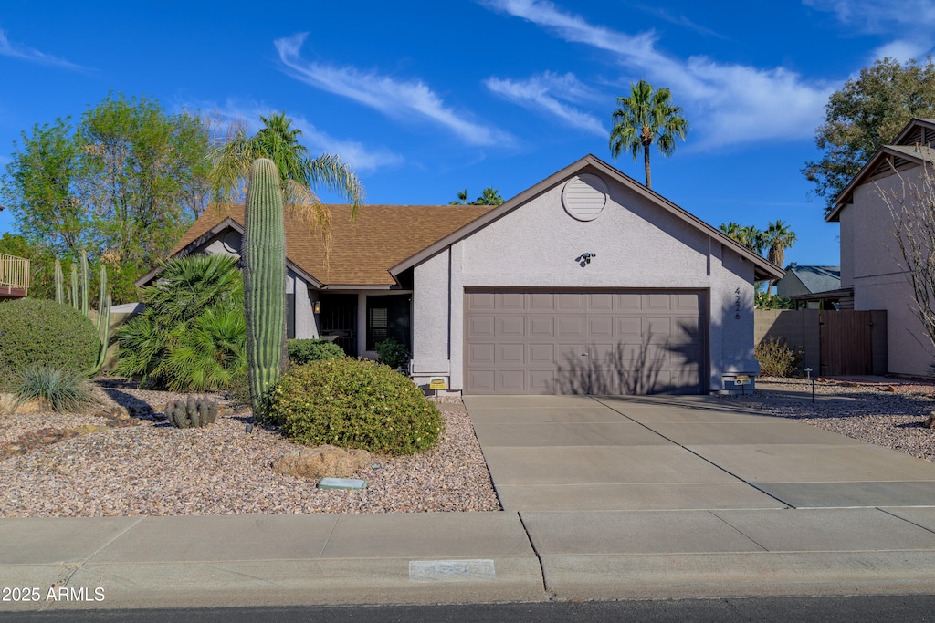 ranch-style house with a garage