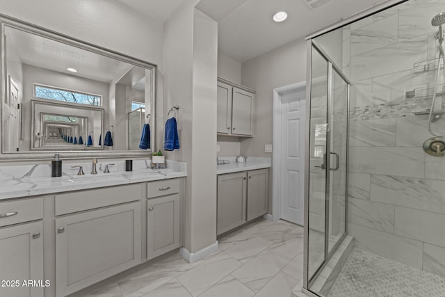 bathroom with vanity and walk in shower