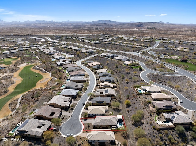 birds eye view of property featuring a mountain view