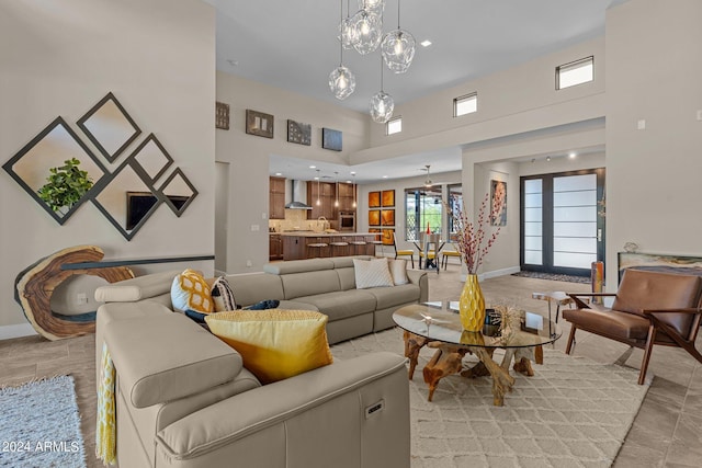 living room featuring a high ceiling