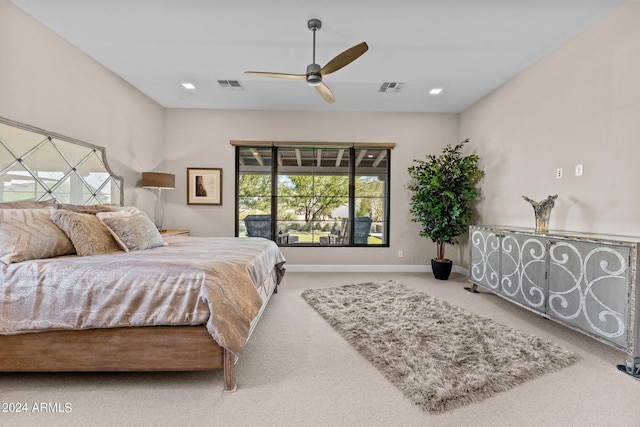 bedroom featuring light carpet and ceiling fan