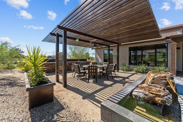 view of patio / terrace featuring a pergola and ceiling fan