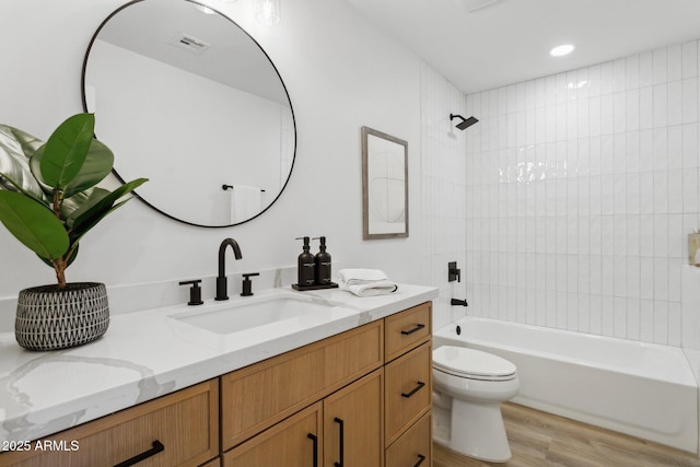 4842 E Surrey Ave, Scottsdale, AZ 85254 - full bathroom with vanity, wood finished floors, and bathing tub / shower combination
