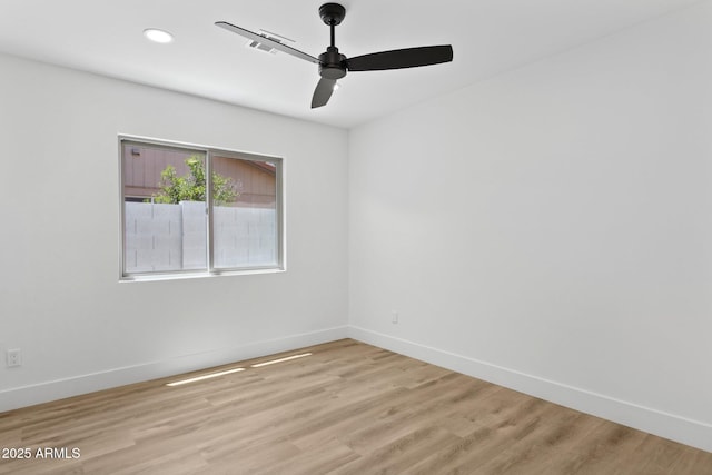 4842 E Surrey Ave, Scottsdale, AZ 85254 - unfurnished room featuring ceiling fan, light wood-style flooring, and recessed lighting