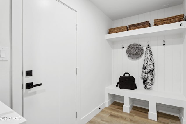 4842 E Surrey Ave, Scottsdale, AZ 85254 - mudroom featuring light wood-style flooring and baseboards