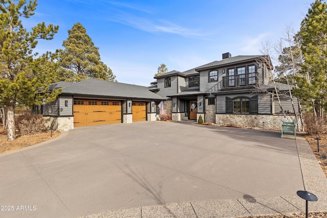 prairie-style home featuring a garage