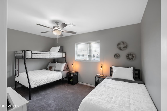 carpeted bedroom with ceiling fan and visible vents