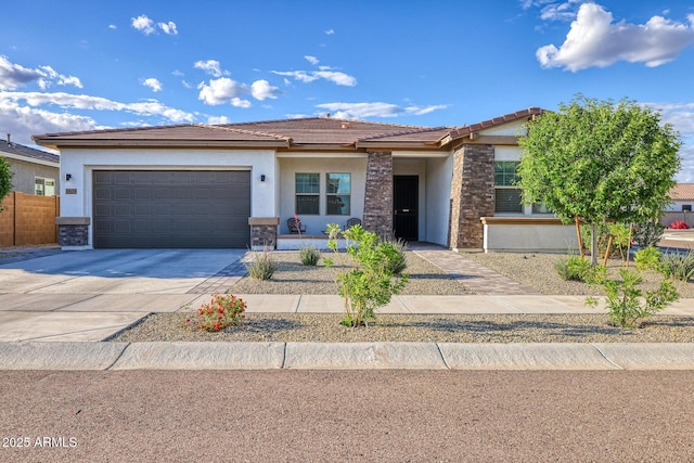 view of front of home with a garage