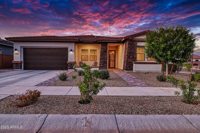 view of front of home with a garage