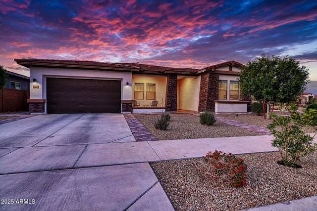 view of front of home with a garage