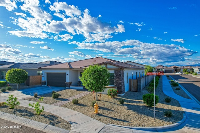 single story home with a garage