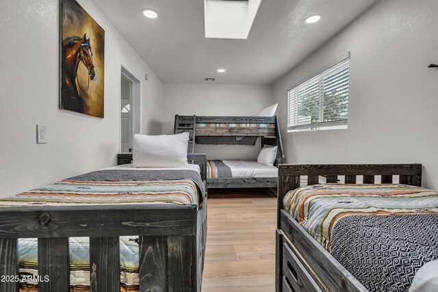 bedroom featuring a skylight