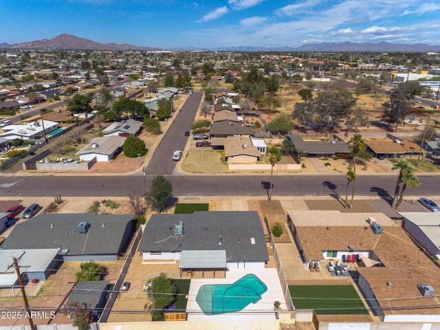 drone / aerial view featuring a mountain view