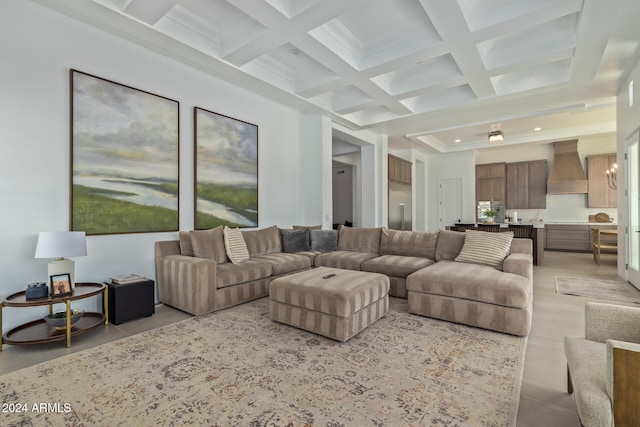 living room featuring coffered ceiling and beam ceiling