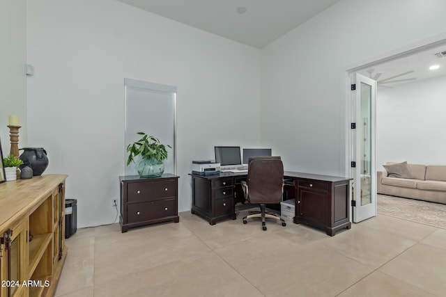 office area with light tile patterned floors