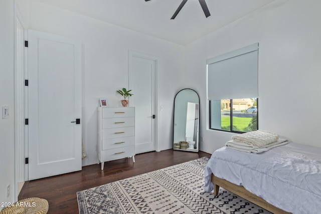 bedroom featuring dark wood-type flooring and ceiling fan