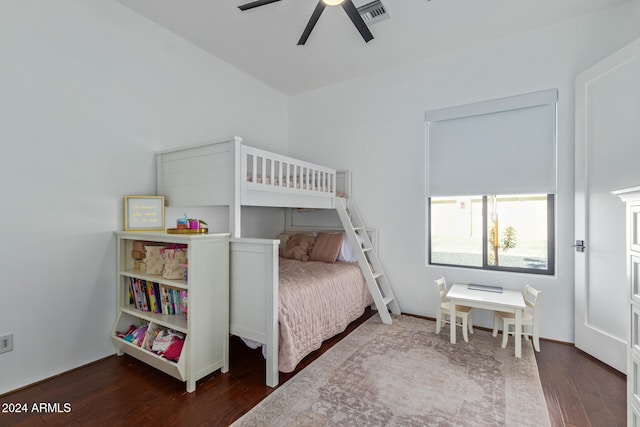 bedroom featuring dark hardwood / wood-style flooring and ceiling fan