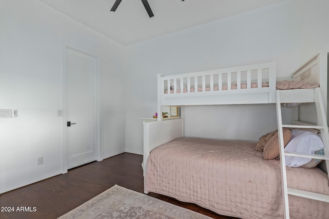 bedroom with ceiling fan and dark hardwood / wood-style floors