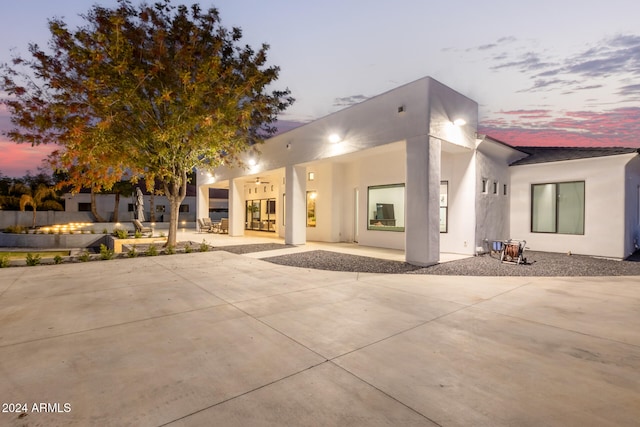 view of front facade with a patio area