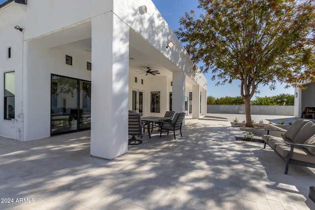 view of patio / terrace with french doors, ceiling fan, and an outdoor hangout area