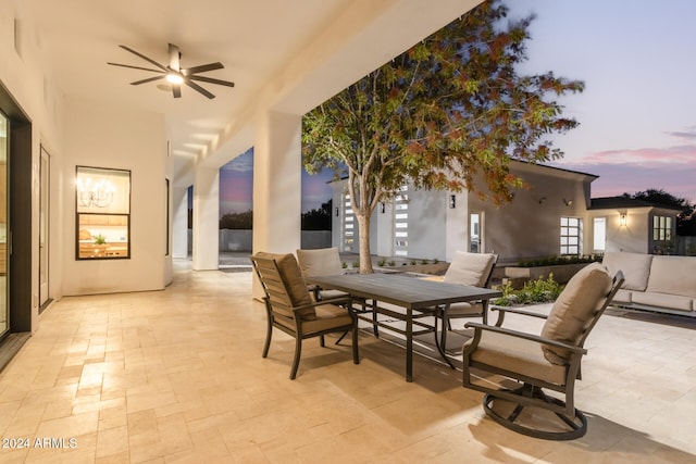 patio terrace at dusk with ceiling fan