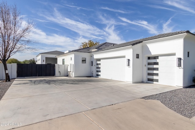 view of property exterior with a garage