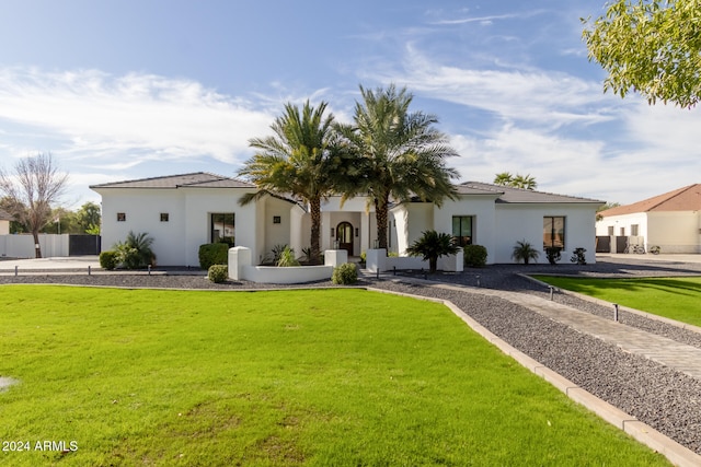 view of front of home with a front yard