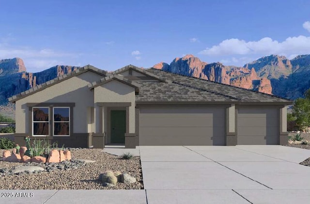 12473 E Bahia Ct, Florence, AZ 85132 - view of front facade with a mountain view, an attached garage, stucco siding, and concrete driveway