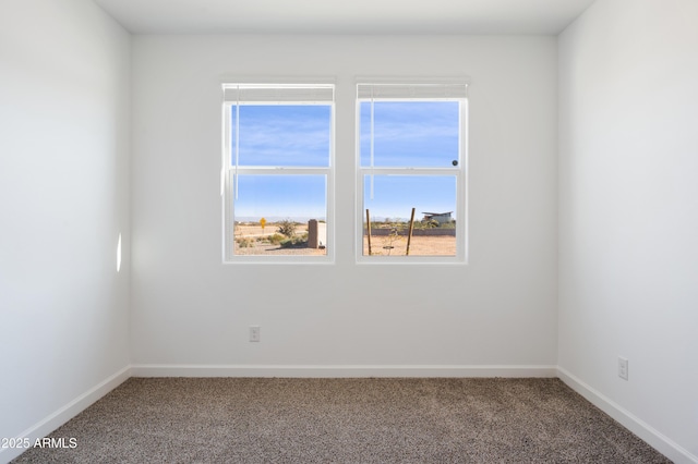 12473 E Bahia Ct, Florence, AZ 85132 - spare room with carpet flooring and baseboards