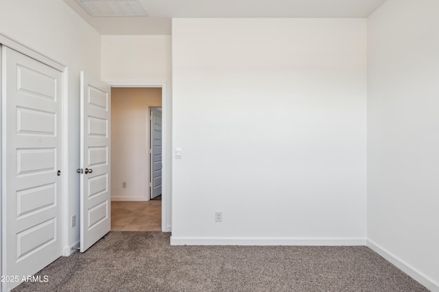 12473 E Bahia Ct, Florence, AZ 85132 - carpeted spare room featuring visible vents and baseboards
