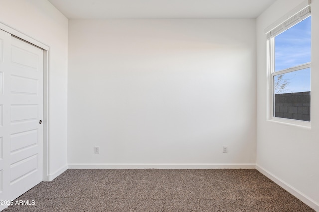 12473 E Bahia Ct, Florence, AZ 85132 - empty room with carpet flooring and baseboards
