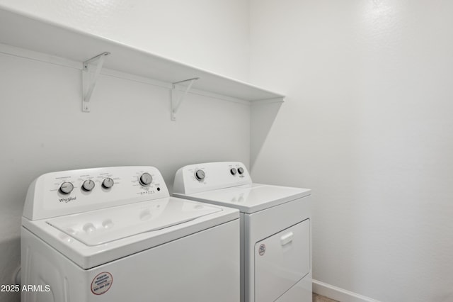 12473 E Bahia Ct, Florence, AZ 85132 - clothes washing area featuring separate washer and dryer and laundry area