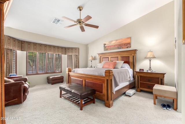 carpeted bedroom featuring ceiling fan and lofted ceiling